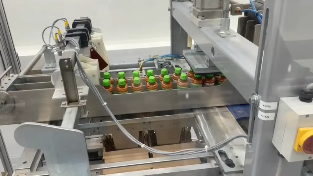 Empacadora de Botellas Caida Libre
